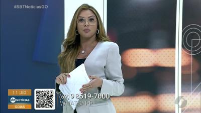 itemCaminhão com colheitadeira fica entalado no viaduto da T-63 em Goiânia